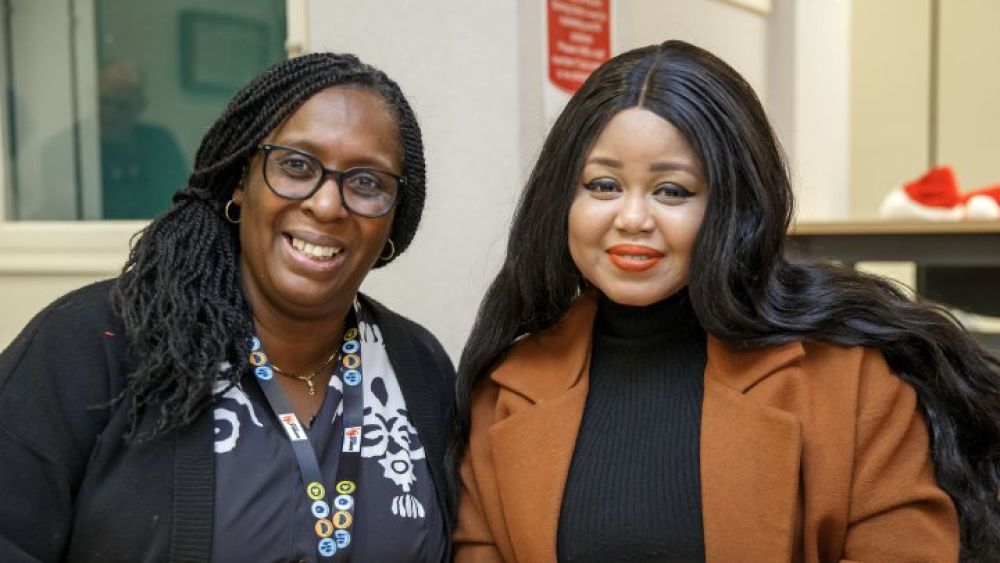 Erica Raval (on the left), Head of Homeownership, with a member of the E500