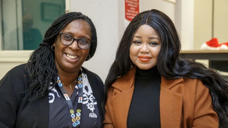 Erica Raval (on the left), Head of Homeownership, with a member of the E500