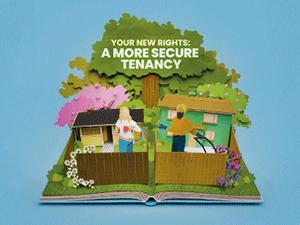 Pop up book with a tree between 2 houses