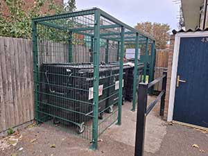 Communal bins inside enclosures