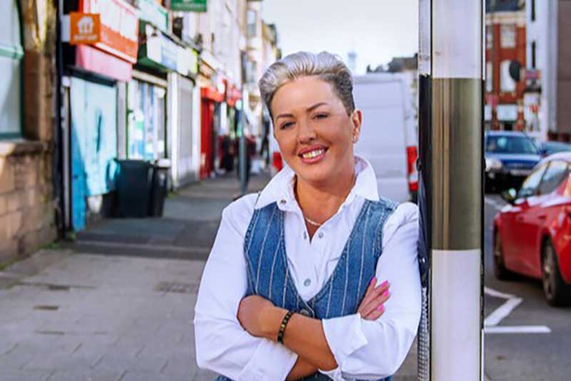 Woman standing on a high street