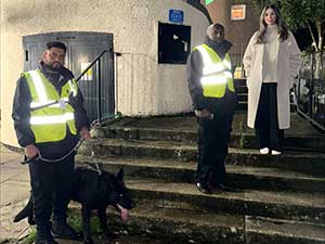 Councillor Guzel with 2 security team members on an estate