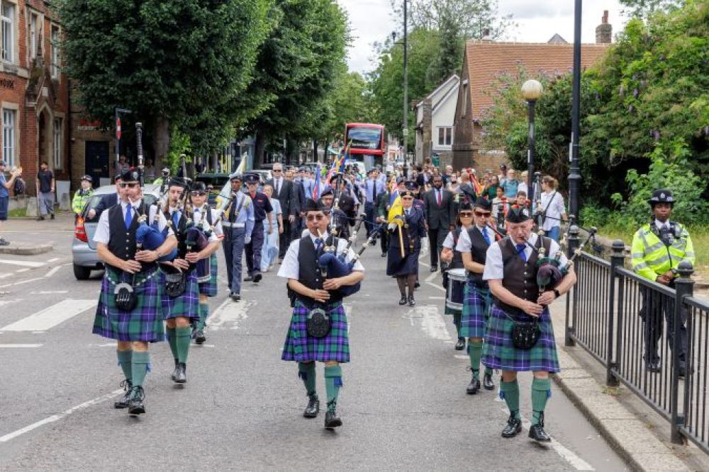 Pipers in the Armed Forces Day Parade through Enfield