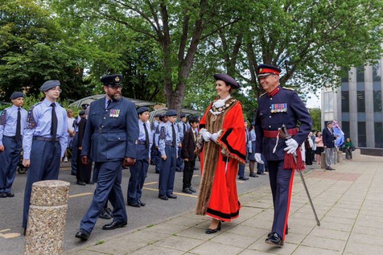 The Mayor passes by cadets lined up opposite the civic centre