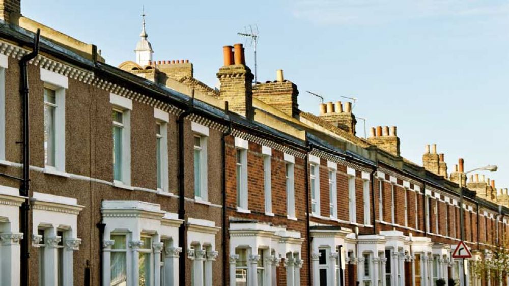 A row of terraced houses, typical of a London street