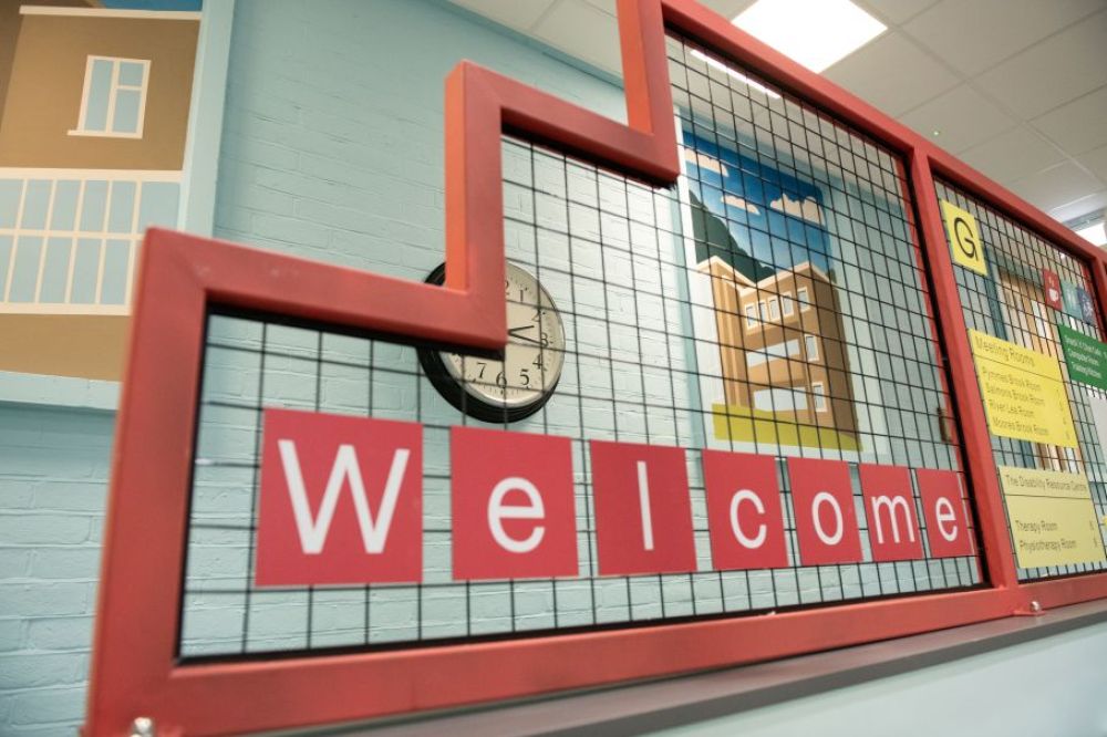 Welcome sign at Community House