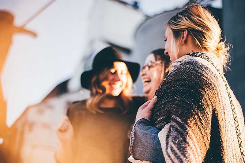 Group of 3 smiling young women