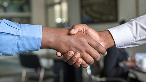 Two people shaking hands