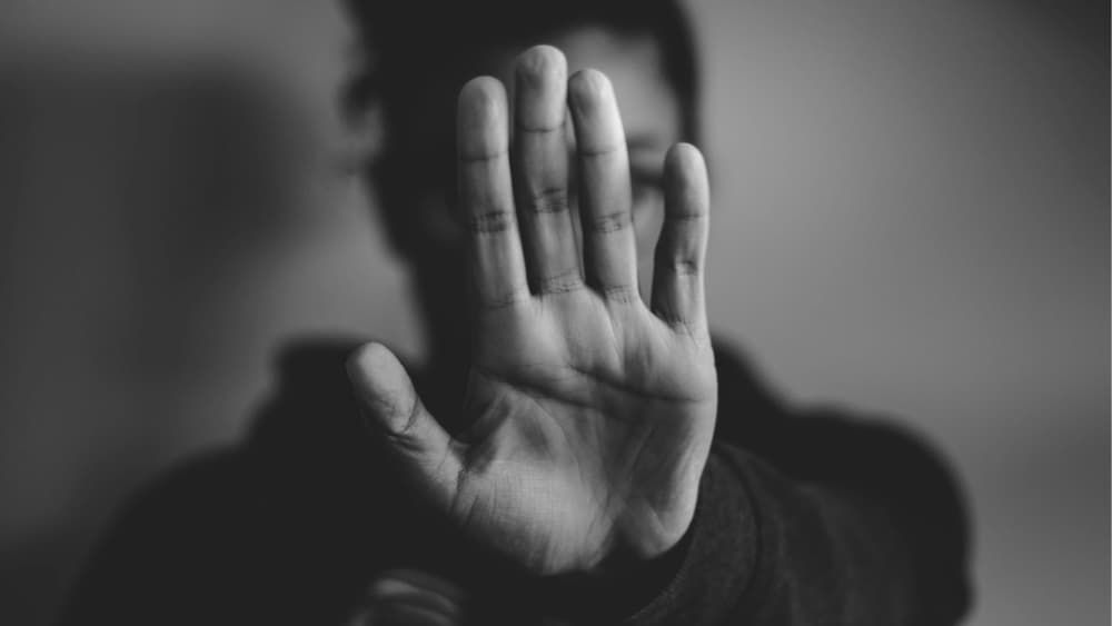 Stop hand sign