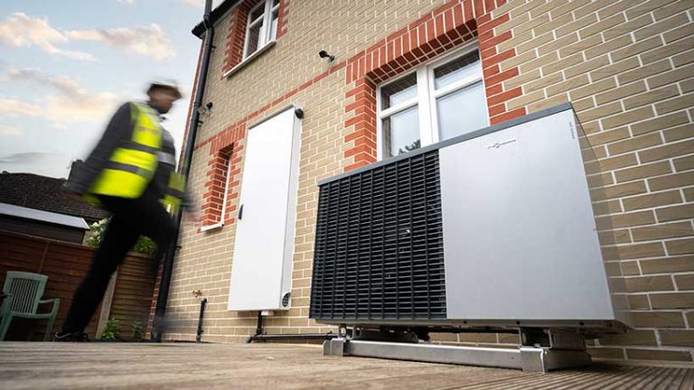 A heat pump outside a home fixed to external wall