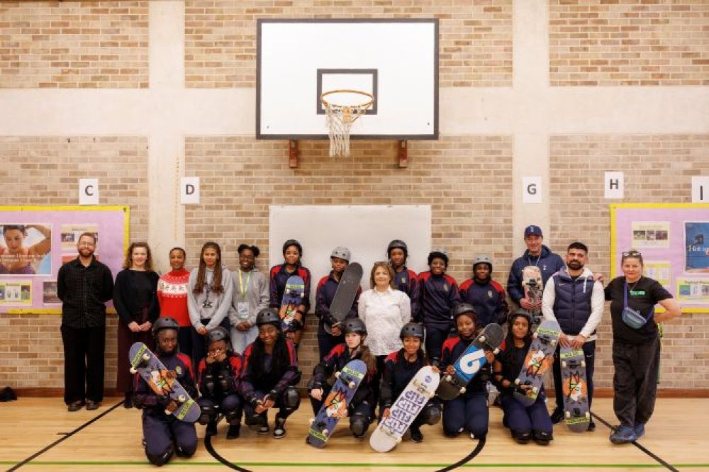 Cllr Cazimoglu with the St Anne's Skaters, teachers and staff