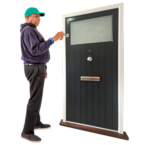 Man opening a door with a key