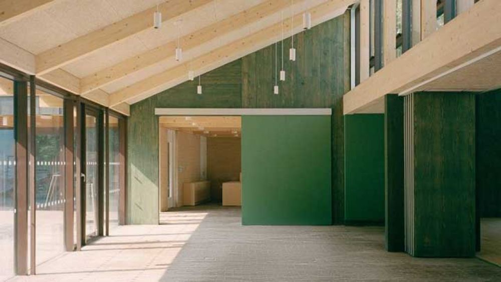 Example of an interior view of a timber community building with high quality construction and use of natural light