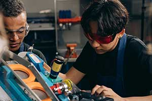 Teenage boy working in a workshop